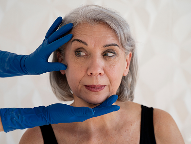 Woman receiving a facial skin assessment